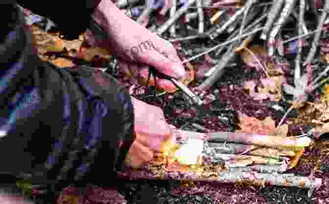 A Camper Demonstrating Wilderness Survival Skills, Such As Fire Building And Water Purification Camping For Dummies Michael Hodgson