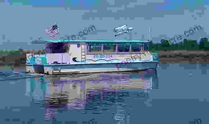 Boat On The Cape Fear River With Wilmington Skyline In The Background The Intracoastal Waterway Norfolk To Miami: The Complete Cockpit Cruising Guide Sixth Edition